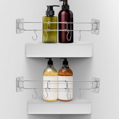 two shelves with soap and lotion bottles on them