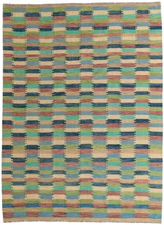 a multicolored rug with squares on it