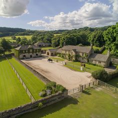 an aerial view of a large horse farm