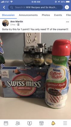 an image of two bottles of food on the counter with other items in the background