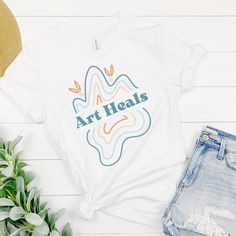 Artist Gift Shirt, Art Quote T-Shirt, Artist Shirt, Art Teacher Gift, Art Lover Tee, Art Line Art Top, Gift for Her, Motivational Tee https://www.etsy.com/listing/1225517423/artist-gift-shirt-art-quote-t-shirt?utm_source=crowdfire&utm_medium=api&utm_campaign=api Artistic Shirt With Custom Print, Artsy Custom Artwork T-shirt For Summer, Artistic Custom Artwork T-shirt For Summer, Funny Art Teacher Shirts, Art Teacher Tshirt, 2023 Board, Art Top, Art Teacher Gifts, Artist Shirts