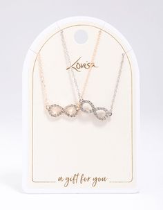 This necklace duo contains two individual pendant necklaces, one in a gold setting and the other in silver. Both pendants feature an eye-catching, infinity symbol for a timeless touch. Dimensions: Chain Length 45cm Extender: 8cm Weight: 16.5g | Lovisa Gold & Silver Infinity Diamante Necklace Pack Infinity Metal Necklace For Gifts, Infinity Metal Necklace For Gift, Adjustable Nickel-free Infinity Necklace, Silver Infinity Metal Necklace, Diamante Necklace, Infinity Symbol, Gold Set, Chain Lengths, Chain Length