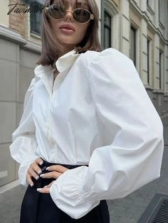 Tavimart White Shirt Women Elegant Lapel Puff Sleeve Blouses Autumn Female Casual Loose Ruched Tops Office Lady Fashion Chic Button Shirt Daywear Puff Sleeve Shirt With Button Cuffs, Puff Sleeve Shirt With Button Cuffs For Daywear, Daywear Shirt With Puff Sleeves, Puff Sleeve Blouson Shirt For Daywear, Classic Lantern Sleeve Tops For Daywear, Chic Tops With Bishop Sleeves And Buttons, Classic Puff Sleeve Shirt With Button Closure, White Puff Sleeve Blouse With Button Cuffs, Puff Sleeve Long Sleeve Top For Work