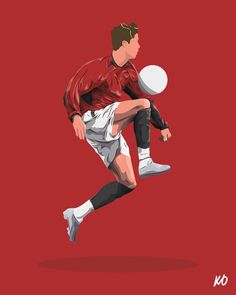 the soccer player is jumping to catch the ball with his legs and feet, while wearing red