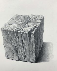 a pencil drawing of a block of wood