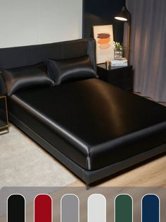 a bed with black leather sheets and pillows