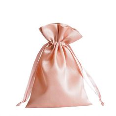 a pink satin bag on a white background