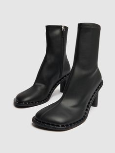 85mm Heel. Synthetic upper. Side zip closure. Studded welt. Rubber sole Stella Mccartney Boots, Sock Ankle Boots, Studded Ankle Boots, Versace Brand, Black Boots Women, Brown Ankle Boots, Heeled Loafers, Shoes Booties, Black Leather Boots