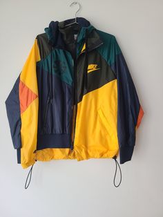 Vintage SACAI x Nike Nylon Jacket.  Size M. Measurements approx.  PTP:64cm. Length:67cm Sleeve:66cm Material: Polyester and nylon. In excellent condition. Buyers, kindly indicate your contact number when making a purchase. All photos were taken under natural lighting. I do not use any filters on my photos. These items were preloved, which means they have a life prior to this. Hence some imperfections maybe found. I try my very best in show these imperfections. Thanks! Nike X Sacai, Best In Show, Trench Jacket, Natural Lighting, Funnel Neck, Oversized Fits, Singapore, Favorite Outfit, Gender Neutral