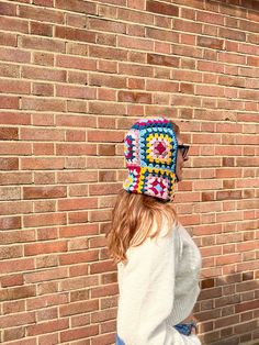 Upgrade your winter wardrobe with our Oversized Crochet Balaclava. Stay warm and stylish with this unisex colorful hat made from cozy chunky yarn. You can use with or without hoodie. Colorful and adds additional beautiful look to your winter outfit. One size fits to all. Keeps warm both your neck and head. M A T E R I A L:  - Mohair, Acrylic  - Hand-knitted - 100% Handmade S I Z I N G: One Size M O D E L . S I Z E: - S and 10 in UK Size, M and 38 in EU Size, XS and 6 in US Size - Height is 172 C Winter Crochet Patterns In Acrylic, Winter Crochet Patterns With Yarn, Bohemian Crochet Hat With Granny Square For Winter, Winter Crochet Hat With Granny Square, Multicolor Granny Square Winter Hat, Multicolor Granny Square Crochet Hat For Winter, Knit Granny Square, Balaclava Knit, Balaclava Crochet