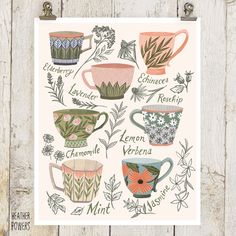 a poster with tea cups and flowers in them on a wooden table next to a wall