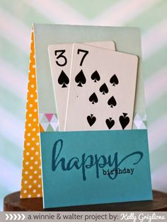 a birthday card with playing cards on it