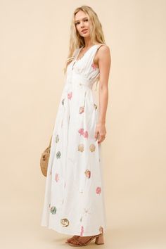 This bestselling style is now back in stock! Nothing says spring and summer like a playful print! Our Lagos Seashell Print Maxi Dress is a classic cotton white dress with an all-over colorful shell embroidery. V neckline and slightly open back with adjustable ties to give you the perfect fit. Smocked waist at the back. This is THE dress of summer. Cotton White Dress, Shell Embroidery, Seashell Print, Dresses Date Night, Wedding After Party, Cool Girl Style, Beach Bride, White Cotton Dress, Casual Day Dresses