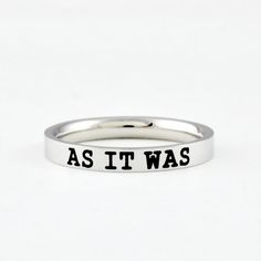 "This listing is for one stainless steel band ring, engraved with \"AS IT WAS\". It makes a great encouragement gift for friends, sisters or yourself.  Materials & Features: This ring is made of high quality hand polished solid stainless steel, which is hypoallergenic (good for metal-sensitive skin). Stainless steel will not tarnish, its luster and durability will make it last for many years. The black text on the ring will not fade out over time. Sizes: This ring is 3 mm wide, dainty and cute, Sisters Best Friends, Encouragement Gift, Her And Him, Friend Bff, Sorority Sisters, Wide Ring, Encouragement Gifts, Fade Out, Wide Rings