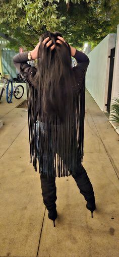 Winter Bohemian Black Vest, Bohemian Fringe Vest For Festivals, Hippie Style Vest For Fall Festival, Black Bohemian Festival Outerwear, Black Bohemian Outerwear For Festival, Bohemian Black Outerwear For Festivals, Bohemian Fringe Outerwear For Rodeo, Fitted Fringe Vest For Festival, Fitted Fringe Vest For Festivals