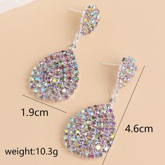 Material: Rhinestone Style: Simple Crystal Rhinestone Earrings For Gifts, Metal Drop Crystal Earrings For Party, Glamorous Metal Crystal Earrings With Rhinestones, Metal Crystal Earrings With Rhinestones As Gift, Crystal Rhinestone Earrings In Metal As A Gift, Crystal Rhinestone Earrings In Metal For Gifts, Crystal Earrings With Rhinestones, Trendy Crystal Earrings With Sparkling Details, Trendy Evening Crystal Earrings With Rhinestones