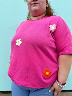 Spring might almost be over but flowers are for all seasons! This oversized pink flower top is a great closet addition- the perfect shade of pink and colorful flowers that go with every pair of bottoms! Jeans, shorts, leggings, skirts, everything! True to size. 80% Polyester 15% Rayon 5% Spandex Oversized fit Colorful flower details Pairs with every color in the rainbow! Yan is wearing the 3XL and she typically is a 3XL. Jess is 5'6 wearing a size small and typically wears a size small. Haley is Pink Tops For Spring Day Out, Pink Tops For A Day Out In Spring, Playful Pink Stretch Top, Fun Pink Tops For Spring, Fun Pink Floral Print Tops, Pink Flower Top, Closet Addition, Flower Top, Rainbow Shop