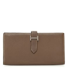 This is an authentic HERMES Epsom Bearn Gusset Wallet in Etoupe. This chic wallet is crafted of fine Epsom calfskin leather in taupe. The wallet features a strap closure and palladium hardware. This opens to a matching leather interior with card slots, patch pockets, and a zipper compartment. Elegant Leather Wallet With Palladium Hardware, Elegant Leather Wallets With Palladium Hardware, Elegant Beige Leather Wallet, Elegant Beige Formal Wallet, Classic Leather Wallet For Everyday Luxury, Beige Leather Wallet For Business, Beige Business Wallet, Elegant Leather Wallet For Everyday Use, Elegant Brown Textured Leather Wallet