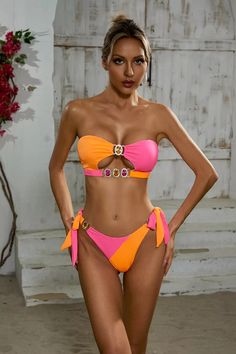 The Rita Orange Diamond Bikini exudes elegance and style. Its detachable padded cups provide customizable support while the crystal diamond detailing adds a touch of sparkle. With its unique bandeau and halter strap design, this two-piece swimsuit is perfect for those looking to make a statement at the beach or pool.  Materials: 100% Polyester Stretch Type: Slight Stretch Washing method: Hand wash  The model is 5 ft 7 and wears size S  Color may vary due to lighting on images. The product images Orange Diamond, Glitter Wedding Dress, Swimwear Trends, Perfect Figure, Halter Strap, Floral Shirt Dress, Travel Party, Crystal Diamond, Puff Sleeve Dresses