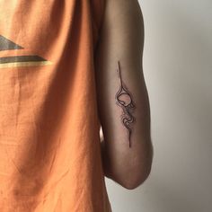 a person with a tattoo on their arm