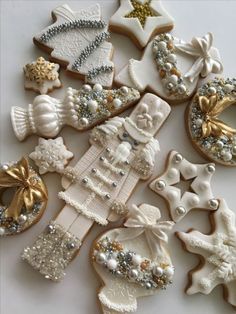 decorated cookies are arranged in the shape of christmas trees