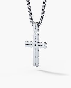 This handmade LA PAZ cross pendant was crafted in likeness of the LA PAZ ring. This pendant features 0.20 ct natural white or black diamonds and is available in both 14k gold, 18k gold and platinum. Customize your piece with any engraving your bold heart desires. This pendant is compatible with chains up to 2.5mm wide and is customizable with any engraving you can imagine. Chain sold separately. White Gold Crucifix Jewelry With Diamond Accents, White Gold Crucifix With Diamond Accents, White Gold Diamond-cut Crucifix Jewelry, White Gold Diamond Cut Crucifix Jewelry, White Gold Crucifix With Diamond Cut, Luxury White Gold Crucifix Jewelry, Silver Cross Jewelry With Single Cut Diamonds, Silver Diamond Crucifix Jewelry, Silver Cross Pendant With Single Cut Diamonds