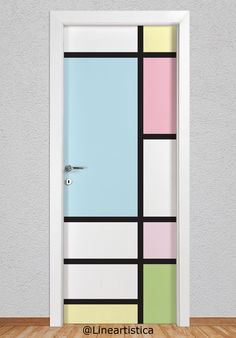 an open door with multicolored squares painted on it