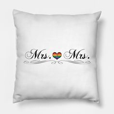 a white pillow with the words mr and mrs written on it in black lettering, along with a heart