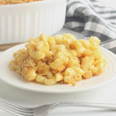 a white plate topped with macaroni and cheese