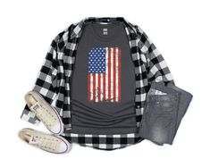 an american flag shirt, jeans and sneakers