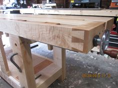 a workbench made out of wood in a shop