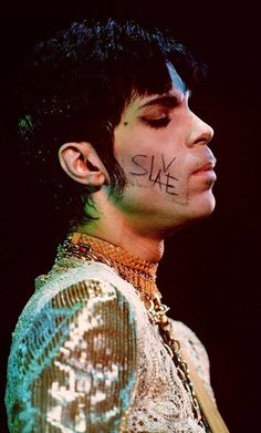 the singer with his name written on his face