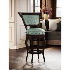 an upholstered bar stool in a living room