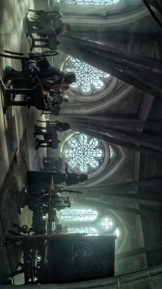 the inside of an old church with stained glass windows