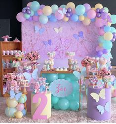 a birthday party with balloons and decorations