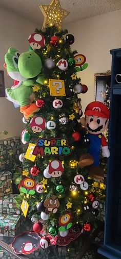 a christmas tree with mario and luigi characters on it