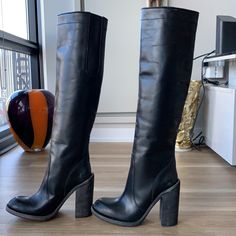 - Designer = Haider Ackermann - Size = 9m(39) -Haider Ackermann Rustic Black Genuine 1leather Made In Italy Block Heel 9m Boots - Heel Height = 5” Inches - Height = Measured At Bottom Tip Of Block Heel To Tip Edge Of Boots = Approximately 57.5cm - Circumference Measured At Topmost 2part Of Boots All Around = Approximately 37cm - Circumference Measured At Sheen Of Boots = Approximately 35.5cm - Genuine And Authentic Or Your Money 2back - Unique And Eye Catching Style And Design. Designer Leather Heeled Boots With Snip Toe, Designer Leather Boots With Stacked Heel, Designer Heeled Boots With Stacked Heel, Leather Sock Boots, Boots Heel, Tall Leather Boots, Haider Ackermann, Leather Socks, High Heel Boots Ankle