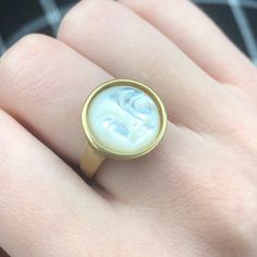 Gold Carved Shell Moon Face Ring. Mother of Pearl. | Etsy Handmade Gold Pearl Ring, Round Brass Moonstone Ring, Gold Mother Of Pearl Ring As A Gift, Brass Moonstone Ring, Gift Brass Moonstone Ring, Gold Mother Of Pearl Ring For Gift, Adjustable Brass Moonstone Ring, Adjustable Gold Moonstone Cabochon Ring, Handmade Mother Of Pearl Shell