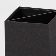 a close up of a black box on a white background