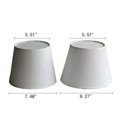 two white lampshades are shown with measurements