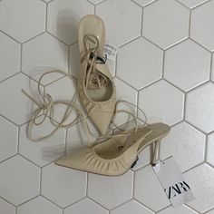 Brand New With Tags. Faux Leather. 3 Inch Heel Approx. Chic Cream Heels With Wrapped Heel, Zara Pointed Toe Heels With Wrapped Heel, Zara Heels With Wrapped Heel And Pointed Toe, Zara Beige Heels With Wrapped Heel, Cream Lace-up Heels For Spring, Zara Cream Synthetic Heels, Zara Beige Heels For Spring, Chic Cream Zara Heels, Cream High Heel Zara Heels