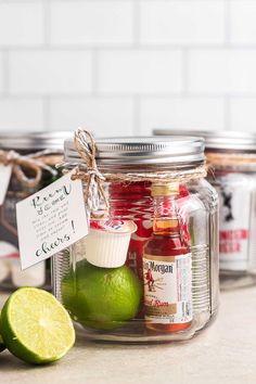 a jar filled with different types of condiments next to lime slices and a bottle of ketchup