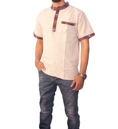 Cotton Shirt (Kurta) --> 100% Organic Cotton --> Made in Nepal --> Half Sleeves --> Front pocket on the left  --> Side pocket on the right Sizes M      Chest(on the front) - 21      Length(shoulders to botton) - 28 L      Chest(on the front) - 22      Length(shoulders to botton) - 29 XL      Chest(on the front) - 23      Length(shoulders to botton) - 30 Colors: Beige, Maroon, Brown --------------------------------------------------- All the items of 'Himalayan Tribes' are made in Nepal in compli Beige Cotton T-shirt With Pockets, Casual Cotton Shirt With Side Pockets, Beige Cotton Tops With Patch Pockets, White Short Sleeve Shirt With Patch Pockets, Beige Cotton Tops With Pockets, Beige Cotton Short Sleeve Shirt With Pockets, Collared Beige Top With Patch Pockets, Cotton Short Sleeve Top With Sleeve Pocket, Cotton Top With Short Sleeves And Sleeve Pocket