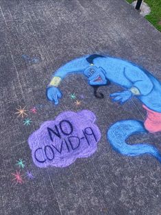 an image of a chalk drawing on the ground