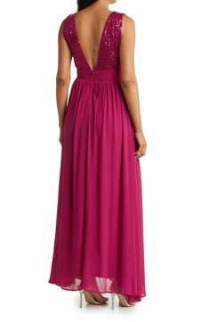 Sparkling sequins bring dazzling allure to a plunging v-neck maxi dress that is styled with a swishy skirt. 60" length (size S) V-neck Sleeveless Main: 95% polyester, 5% spandex; lining: 100% polyester Hand wash cold, lay flat to dry Imported Model stats: 5'10", 32" bust, 25" waist, 36" hip. Model is wearing size S. V-neck Sequin Maxi Dress For Party Season, Sequin V-neck Maxi Dress For Party Season, Glamorous V-neck Sequined Maxi Dress, Sequin Maxi Dress For Prom, V-neck Sequin Dress With Contrast Sequin For Prom, Glamorous Backless Maxi Bridesmaid Dress, Prom Maxi Dress With Contrast Sequin, Prom Season Maxi Dress With Contrast Sequin, Floor-length Maxi Dress With Contrast Sequin For Prom