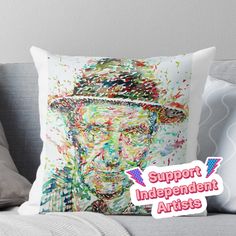 a pillow with the words support independent artists on it