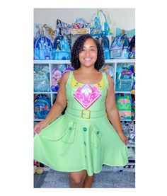 Product Description: Embark on a magical journey of strength and style with "Tiana's Enchanted Bayou: Women's Sleeveless Athletic Skater Dress." Inspired by Princess Tiana's transformative adventure in the mystical bayous, this dress embodies the spirit of determination and elegance. As you slip into this athletic skater dress, imagine yourself leaping and twirling through the lush, enchanted wetlands. The high-performance fabric mimics the cool, dewy atmosphere of the bayou, keeping you dry and comfortable as you navigate through your fitness routine. The sleeveless design and flared skirt allow you to move with the grace and agility of Tiana herself, whether you're conquering the gym or dancing under the stars at a royal ball. Key Features: High-quality moisture-wicking fabric that feels Casual Sleeveless Dress For Cosplay, Royal Ball, The Bayou, Princess Tiana, Under The Stars, The Cool, Skater Dress, Moisture Wicking Fabric, Flare Skirt