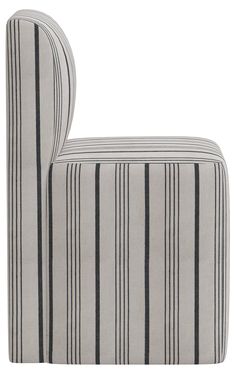 a pair of black and white striped upholstered chairs