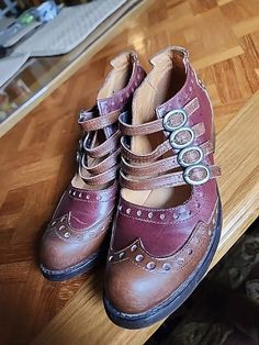 John Fluevog Adrian Alli four buckle wingtip brogue mary jane shoes size 7 | eBay John Fluevog Shoes, John Fluevog, Pleaser Shoes, Reddish Brown, Crystal Lake, Mary Jane Shoes, Brown Color, Mary Janes, Flat Shoes Women