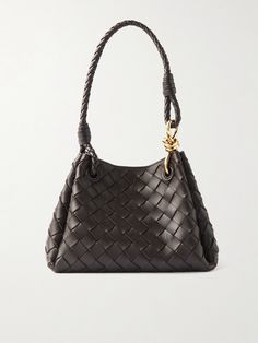 Bottega Veneta's 'Parachute' shoulder bag is intrecciato woven from leather - a symbol of the label's artistry, and which feels beautifully soft and pliable. In a small size that expands slightly by virtue of the side folds, it'll fit your phone, cardholder and AirPods. Top Handle Bags, Shoulder Bag Designer, Unique Designer Bags, Handle Bag, Bottega Bags, Statement Bags, Designer Bag, Designer Bags, Bottega Veneta Bag Aesthetic